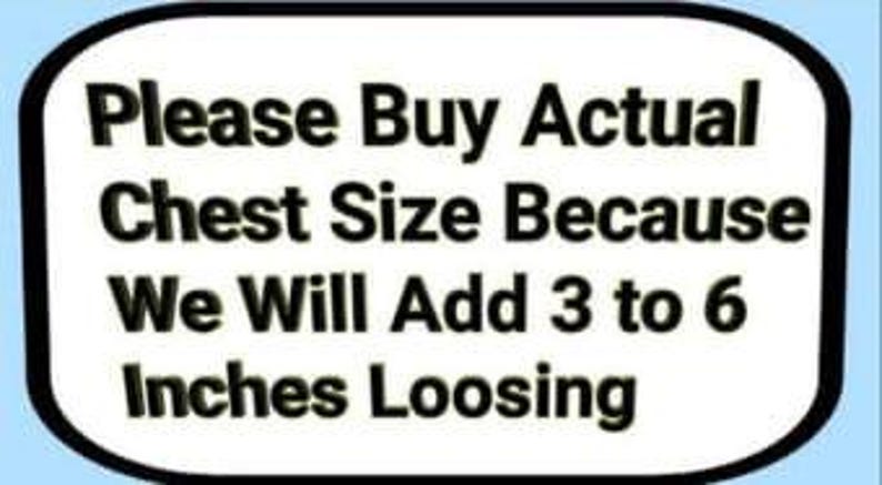 May include: A white oval sign with a black border and text that reads "Please Buy Actual Chest Size Because We Will Add 3 to 6 Inches Loosing". The sign is on a blue background.
