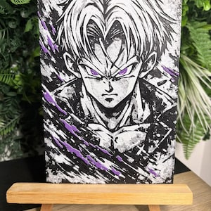 May include: A black and white illustration of an anime character with white hair and purple eyes. The artwork features purple paint splatters and is displayed on a small wooden easel. The overall theme is anime art.