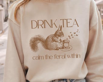 Drink Tea Calm the Feral Sweatshirt, Whimsical Cottagecore Squirrel Sweatshirt, Funny Gift for Tea Lover