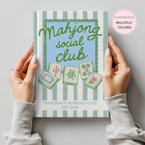 May include: A book cover with a light green and white vertical striped background. The center features a light blue rectangle with a scalloped border, displaying the green text Mahjong social club above four mahjong tiles. Text reads PALM BEACH MAHJONG CLUB EST. 2026.