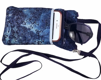 Cell phone cross body bag, minimalist size, yet room for essentials. lightweight crossbody with slip pocket and zipper pocket