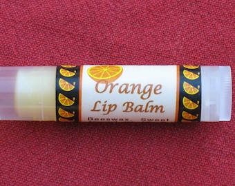 Orange flavored lip balm extra creamy because of kukui nut oil, aloe vera butter, and Vit. E. Other flavors are available
