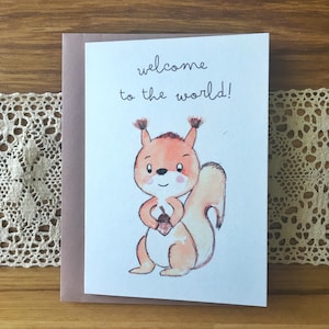 Schattige eekhoorn-wenskaart voor kinderen - aquarel bosdierkaart, babyshower- of verjaardagskaart, noot- of eikelillustratie, handgemaakt