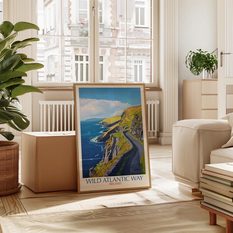 a framed poster of the "Wild Atlantic Way" in Ireland, displayed in a living room setting with a window and various furniture.