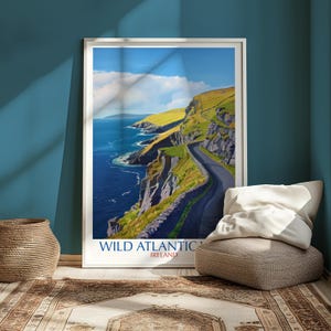 a large framed poster of the Wild Atlantic Way in Ireland, with a scenic coastal landscape and a winding road.