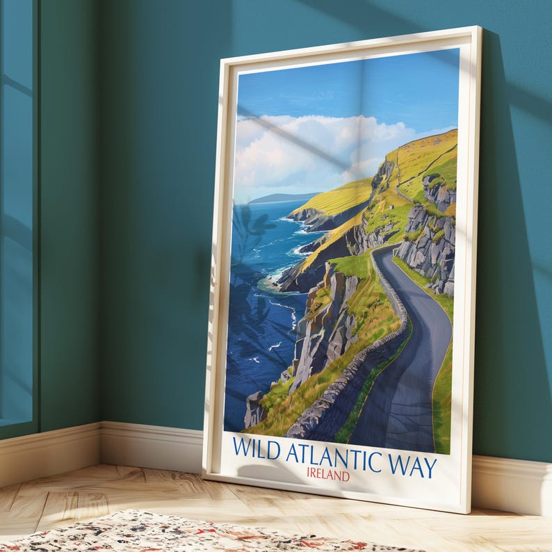 The image is a framed poster depicting the Wild Atlantic Way in Ireland, with a winding road leading through a scenic coastal landscape with cliffs, water, and a blue sky.