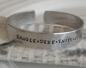 Dangle Deke Snipe Celly Aluminum Cuff Bracelet