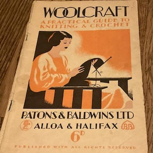 May include: Vintage "Woolcraft" booklet with a practical guide to knitting and crochet. The cover features an illustration of a woman knitting, with orange and black accents. Published by Patons & Baldwins Ltd.