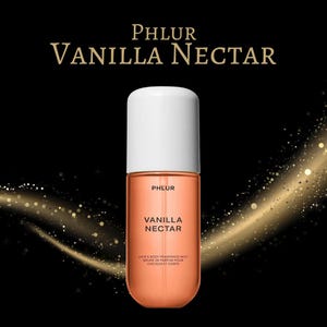 May include: A bottle of Phlur Vanilla Nectar hair and body fragrance mist. The bottle is peach-colored with a white cap. The product name and description are printed in white on the bottle against a black background with gold accents.