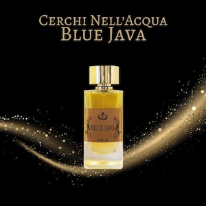 May include: A rectangular perfume bottle with a gold cap and a brown label that reads "BLUE JAVA". The bottle contains a yellow liquid and is set against a black background with gold glitter accents. The text "Cerchi Nell'Acqua" is at the top.