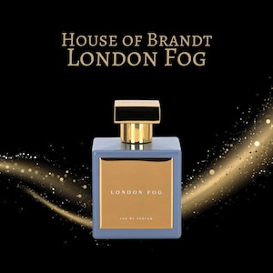 May include: A blue glass bottle of London Fog perfume by House of Brandt. The bottle has a gold cap and a gold label with the words "London Fog" printed on it.