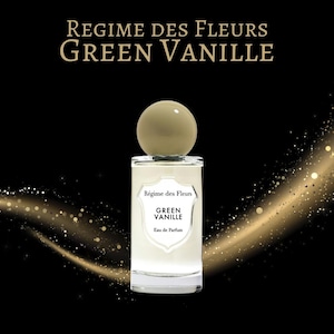 May include: A perfume bottle with a light green liquid and a round, light green cap. The bottle has a white label with the text "Regime des Fleurs Green Vanille Eau de Parfum" on a black background with gold sparkles.