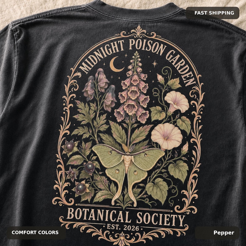 May include: A charcoal gray t-shirt featuring a back graphic of a pale green moth centered among botanical illustrations of foxgloves and morning glories, enclosed in an ornate frame with the text Midnight Poison Garden Botanical Society Est. 2026.