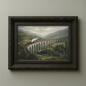May include: A framed print of a train crossing a stone bridge over a valley. The artwork features a steam train on a curved bridge with multiple arches. The frame is dark brown with ornate detailing. The background shows green hills and a cloudy sky.