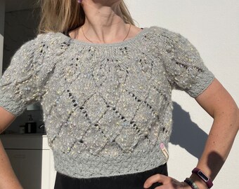 Grey bolero with drops of baby pink , yellow and blue. Lovely and unique women’s wear. Summer evening top