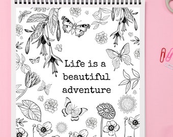 May include: Black and white coloring page featuring a floral design with butterflies and the text "Life is a beautiful adventure".