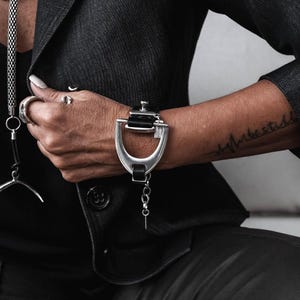 Standout leather and metal stirrup bracelet, bold equestrian bracelet