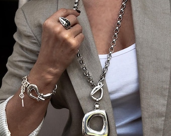 Statement metal necklace and bracelet set, unode50 style jewelry, heavy stainless steel chain with chunky pendant and buckle