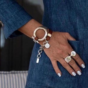 Unique double wrap bracelet in Unode50 style, Metal and leather cuff with stainless steel chain for a Sharp and Chic look. A standout piece!