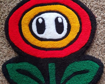 Alfombra tejida a mano con diseño de flor de fuego / Decoración gamer personalizada / Arte inspirado en Nintendo hecho a mano