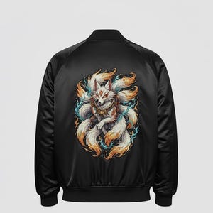 May include: Black satin bomber jacket with a detailed illustration of a nine-tailed fox. The artwork, with fiery orange and blue accents, is centered on the back. The jacket showcases the mythical creature's intricate design and vibrant colours.