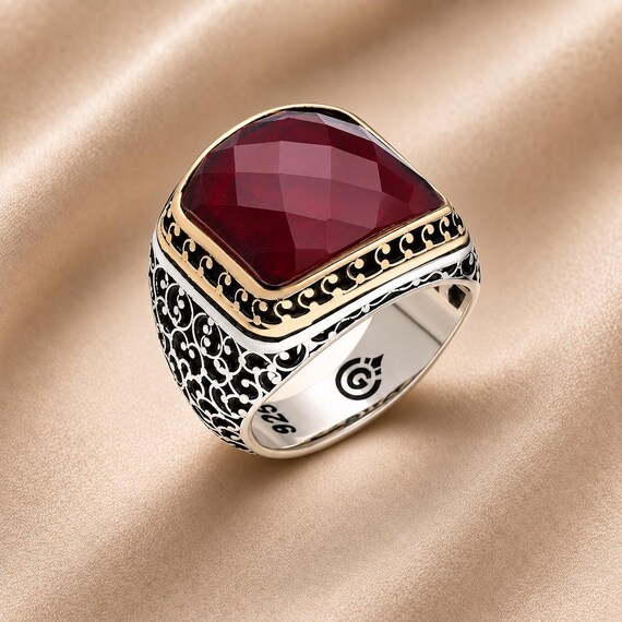 Oxidized 925 sterling silver statement ring with a deep ruby red stone — ornate, darkly romantic, and the kind of chunky vintage-style piece that looks like it was pulled from an antique market in Istanbul.