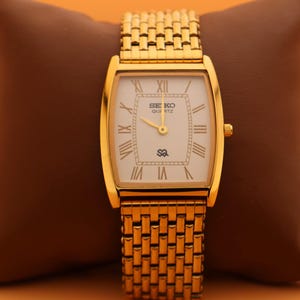 A Collector’s Dream Piece White Dial and Gold Case, Paired with a Matching Gold Chain Bracelet — Seiko Slim Vintage Quartz Men’s Wristwatch