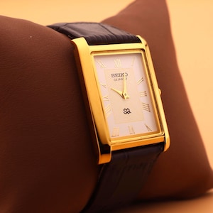 Old Elegance Reborn White Dial and Gold Case, Paired with a New Dark Brown Leather Strap — Seiko Slim Vintage Quartz Men’s Wristwatch