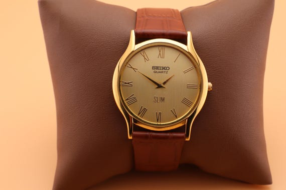 Refined and Elegant Seiko Round Vintage Quartz Men’s Watch with Gold Case - Gold Dial Comes with New Light Brown Leather Strap