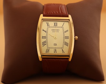 Sleek  Strong Smart Seiko Slim Vintage Barrel Tank Quartz Men's Wrist Watch With Gold Dial and New Camel Strap