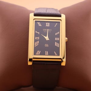 Classic-Inspired  Black Dial and Gold Case, Paired with a New Dark Brown Leather Strap — Seiko Slim Vintage Quartz Men’s Wristwatch