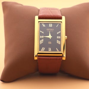 Black Dial and Gold Case, Paired with a New Camel Leather Strap — Seiko Slim Vintage Quartz Men’s Wristwatch