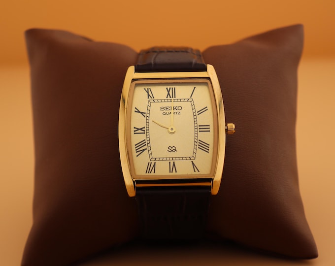 Always in style Seiko Slim Vintage Barrel Tank Quartz Men's Wrist Watch With Gold Dial and New Dark Brown Strap