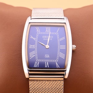 Classic with an edge  Seiko Slim Vintage Barrel Tank Quartz Men&#39;s Wrist Watch With Blue Dial