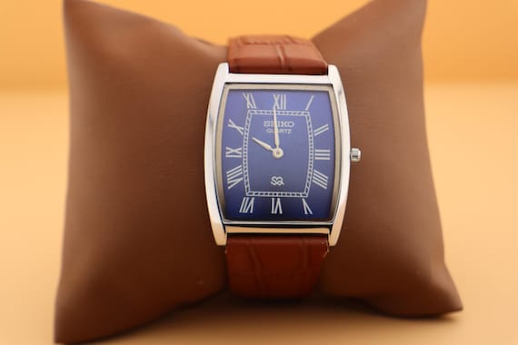 Designed to impress Seiko Slim Vintage Barrel Tank Quartz Men's Wrist Watch With Blue Dial and New Camel Strap
