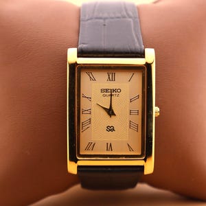 Refined and Elegant Seiko Slim Vintage Quartz Men’s Watch with Gold Case - Gold Dial Comes with New Black Leather Strap