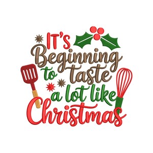 May include: A festive design with the text "It's Beginning to Taste a lot like Christmas" in red, green, and brown. A red spatula and whisk flank the text, with holly and berries at the top. The design is perfect for holiday decor.