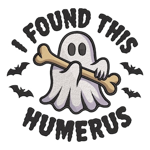 May include: Embroidered design featuring a cartoon ghost holding a bone, with the text "I FOUND THIS HUMERUS" in a circular layout. Black bats surround the central image on a white background. The design has a Halloween theme.