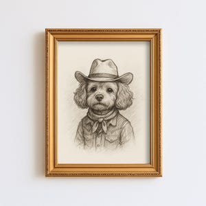 May include: Pencil sketch of a dog wearing a cowboy hat, shirt, and neckerchief. The artwork is framed in a gold-colored rectangular frame. The dog has curly fur and a serious expression.