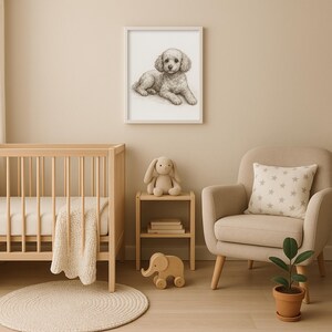May include: A framed pencil sketch of a dog hangs above a wooden crib in a nursery. The room features a beige armchair with a star-patterned pillow, a small wooden side table with a stuffed bunny, and a wooden elephant toy. A round rug and potted plant complete the scene.