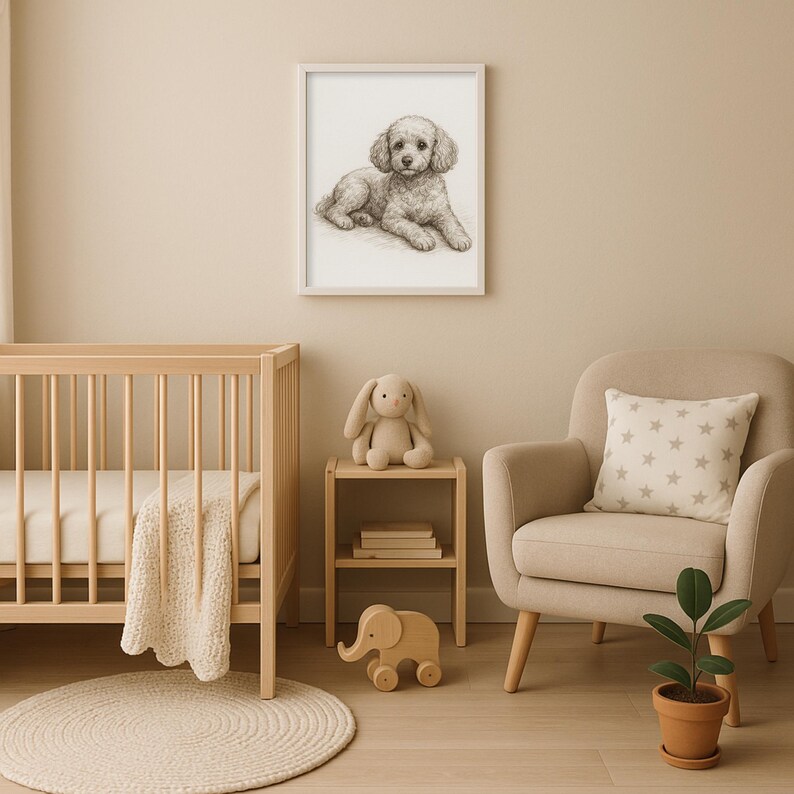 May include: A framed pencil sketch of a dog hangs above a wooden crib in a nursery. The room features a beige armchair with a star-patterned pillow, a small wooden side table with a stuffed bunny, and a wooden elephant toy. A round rug and potted plant complete the scene.