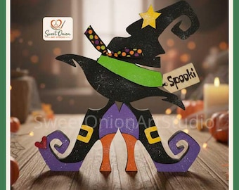 May include: A black wooden cutout decoration featuring a witch hat with a yellow star, a green band, and a tag reading Spooki. Below are two purple and black boots with orange heels and yellow buckles, accented by a small red heart on the left side.