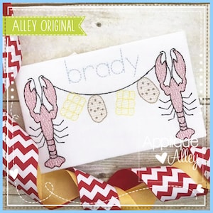May include: Embroidered design featuring a lobster with a string of lights and the name "brady" above. The design is on a white fabric background.