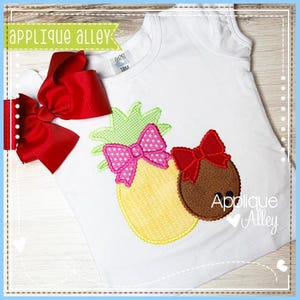 May include: White sleeveless shirt with a yellow pineapple and brown coconut applique, each adorned with a bow. A red bow is placed to the left of the shirt. The text "Applique Alley" is visible.