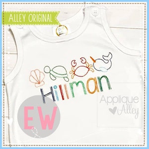 May include: White sleeveless shirt with a colorful embroidered design of a seashell, turtle, crab, and narwhal. The name "Hillman" is embroidered in colorful letters below the sea creatures. The shirt has a pink circle with the letters "EW" in white.