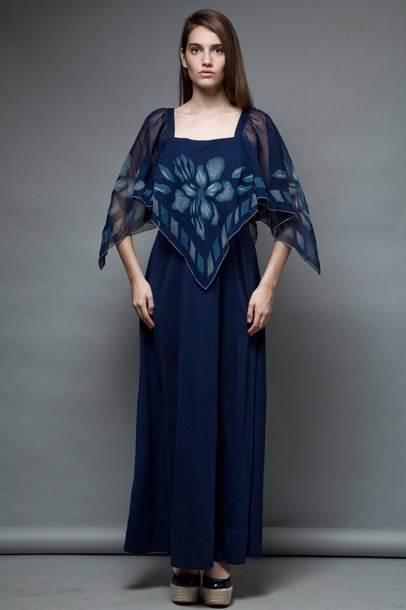 dress with sheer cape