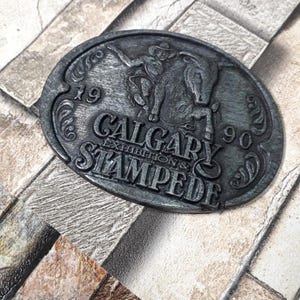 Vintage Calgary Stampede Belt Buckle 1990 – Tin Rodeo Western Buckle – Made in Canada