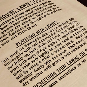 May include: Close-up of a vintage lawn seed packet with instructions for planting new lawns. The text reads "Own House Lawn Seeds" and includes information about the blend of seeds, including Kentucky Blue Grass, Bent Seed, and White Clover.