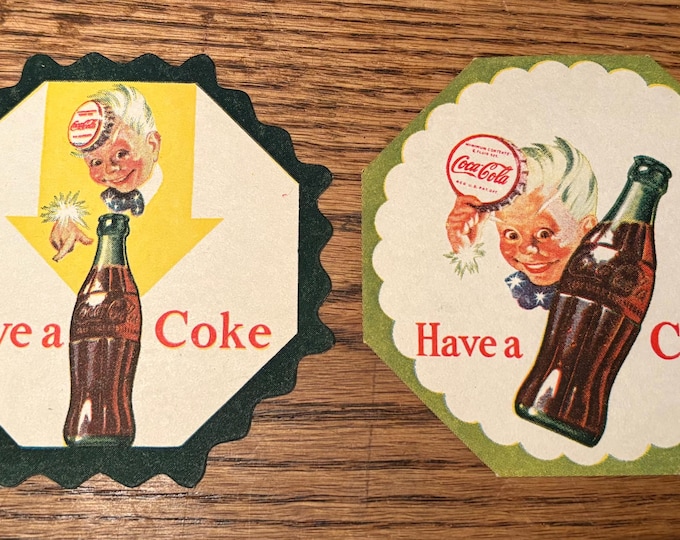 Pair of Original 1950's Die Cut Coca-Cola Coasters featuring Sprite Boy New Old Stock! Coke Advertising