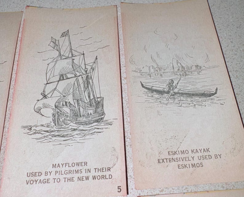 May include: Two pages from a vintage book with illustrations. One shows a sailing ship labeled "Mayflower" and text about the Pilgrims' voyage. The other depicts an "Eskimo Kayak" with text about its use by Eskimos. The number "5" is visible.